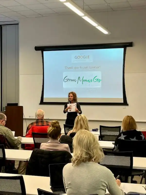 Neneh Biffinger leading a builder sales training about booth success